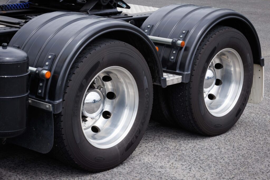 Close-up of RHINO recycled plastic mudguards on truck.