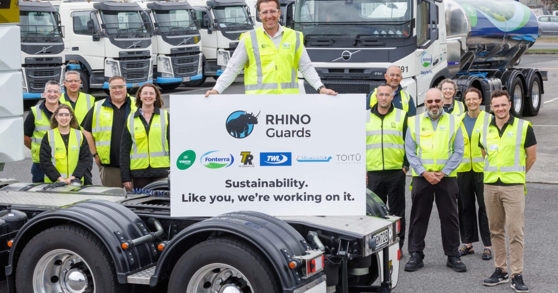 RHINO and partner representatives celebrating Toitū Envirocare verified carbon footprint for recycled mudguards.